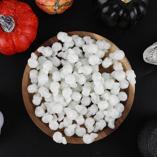 CCINEE 100Pcs Glow in The Dark Mini Skull Heads Miniature Figurines - Plastic Halloween Decorations for DIY Crafts, Home Prank Props, Party Favors